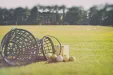 Golf At The Driving Range Basket With Golf Balls At The Rough Zone Of Course Stock Photography