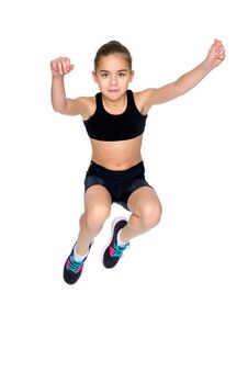 Girl Gymnast Jumping. Royalty Free Stock Photos