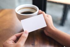 Hands Holding An Empty Business Card Stock Photos Hands Holding An Empty Business Card Stock Photos