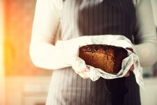 Woman Hands Holding Freshly Baked Bread. Handmade Brown Loaf Of Bread, Bakery Concept, Homemade Food, Healthy Eating Royalty Free Stock Image