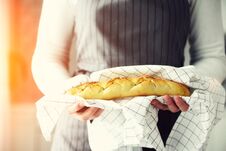 Woman Hands Holding Freshly Baked Bread. French Baguette, Bakery Concept, Homemade Food, Healthy Eating. Copy Space Royalty Free Stock Photography