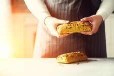 Woman Hands Holding Freshly Baked Bread. Bun, Cookie, Bakery Concept, Homemade Food, Healthy Eating. Copy Space. Banner. Royalty Free Stock Image
