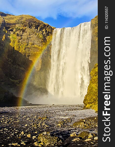 Rainbow at Skogafoss waterfall in southern Iceland along scenic ring road. Autumn season. Rainbow at Skogafoss waterfall in southern Iceland along scenic ring road. Autumn season.