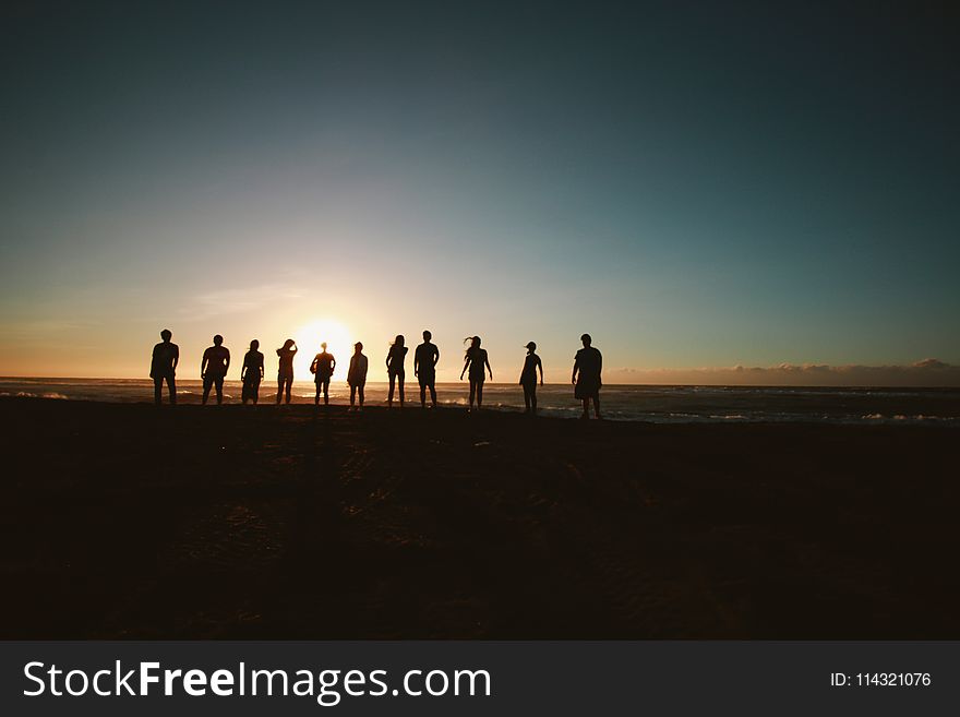 Silhouette of People during Sunset