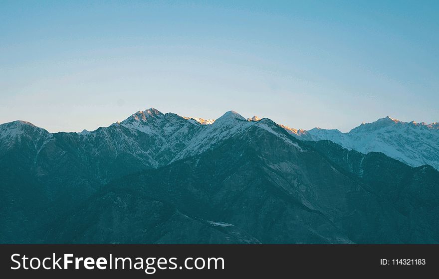 Landscape Photography Of Snow Capped Mountains