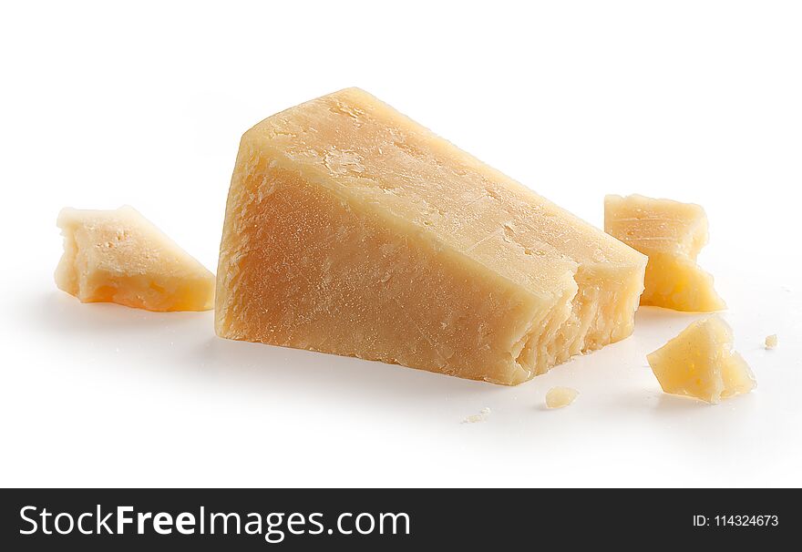 Isolated pieces of parmesan cheese on the white background