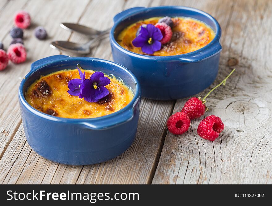 Fresh Creamy and delicious Creme Brulee with fresh raspberries