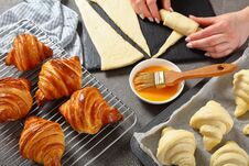 Woman Is Shaping Dough To Bake French Croissants Stock Photos Woman Is Shaping Dough To Bake French Croissants Stock Photos