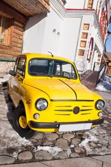 ZAZ Yellow Retro Car Parked On The Parking Space. Stock Images