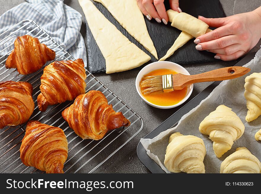 Woman Is Shaping Dough To Bake French Croissants