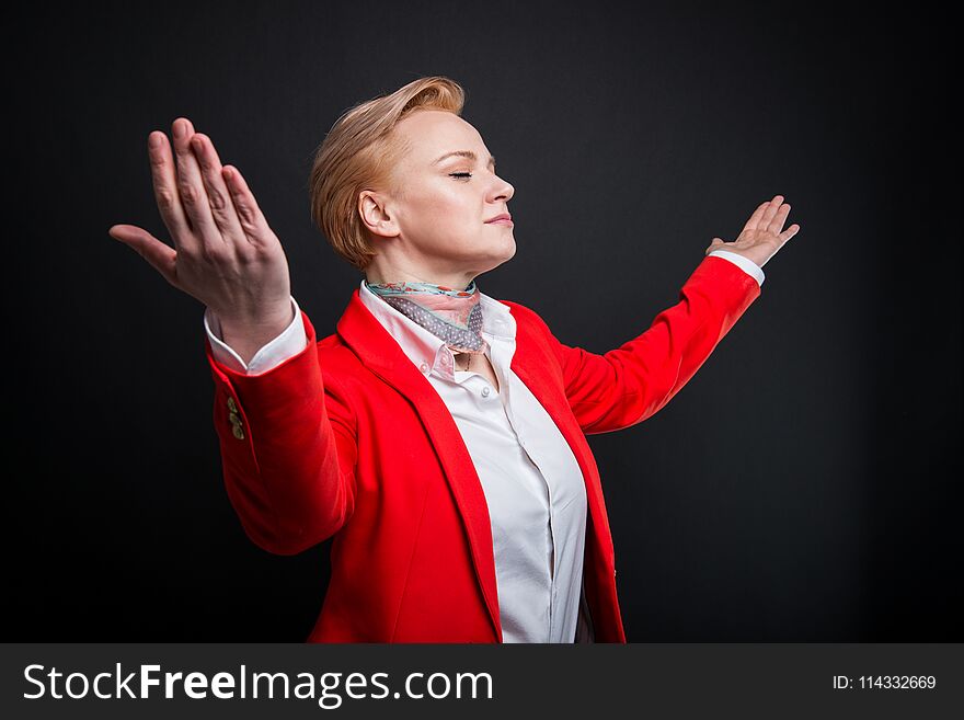 Portrait of attractive business woman holding arms spread