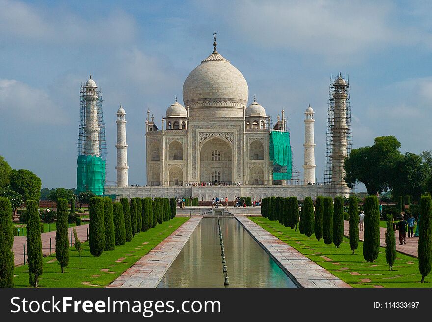 The Taj Mahal is under renovation. The Pillars are covered in scaffolds. The Taj Mahal is under renovation. The Pillars are covered in scaffolds.