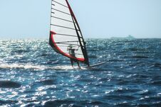 Windsurfing On The Background Of Sea And Sky Royalty Free Stock Photography