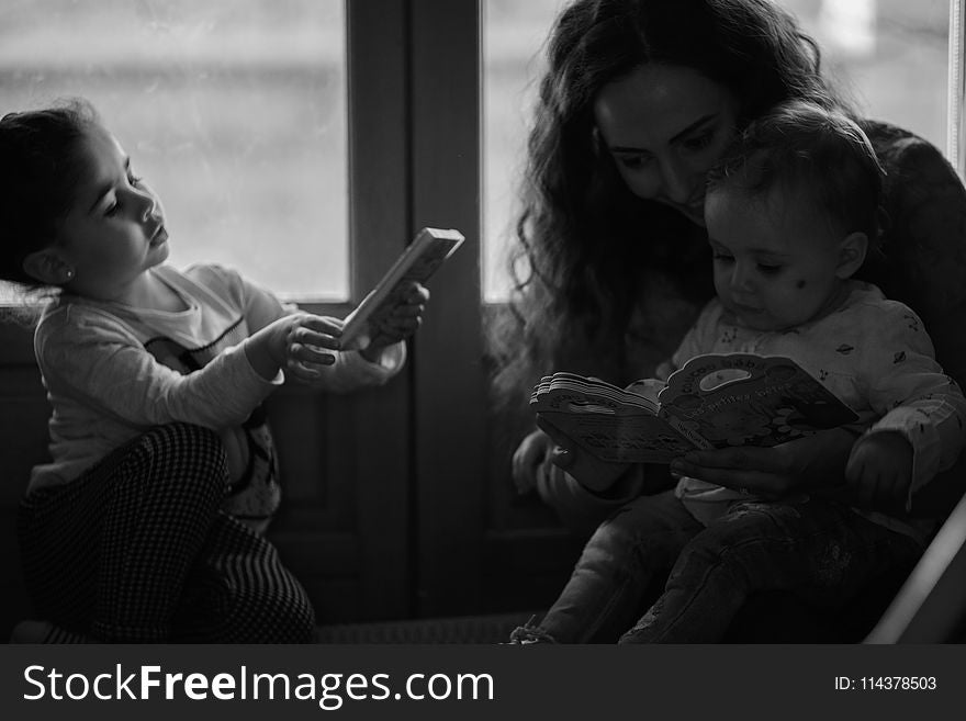 Black and White Photo of Mother and Children