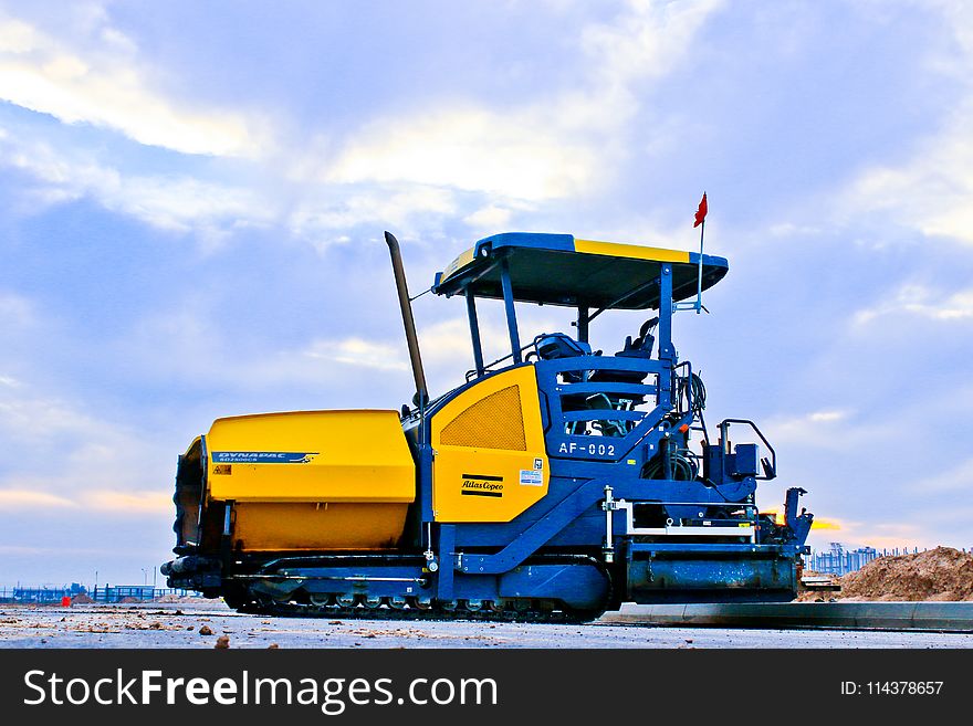 Photo Of Blue And Yellow Truck
