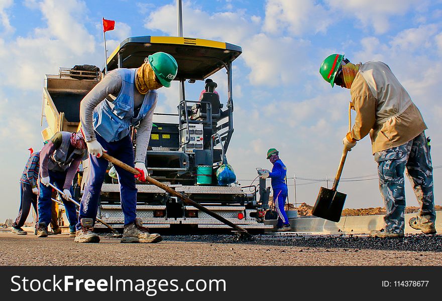 Construction Workers On Road