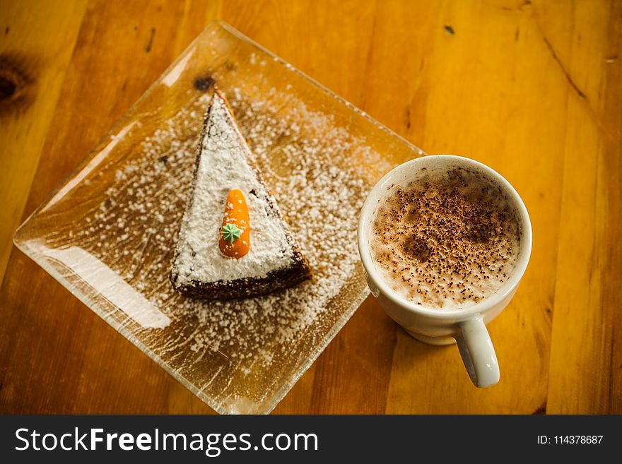 White Ceramic Cup And Dessert