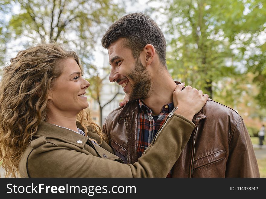Photography of a Couple Smiling