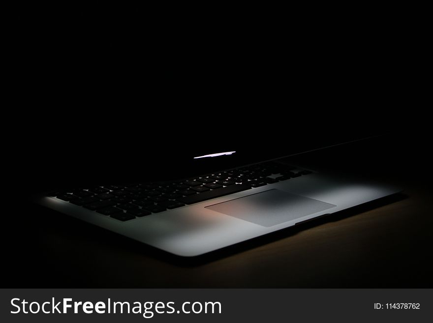 Photography of Laptop In a Dark Area