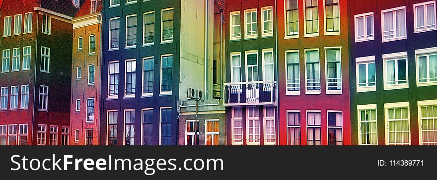 Multicolored rainbow houses. Traditional old buildings in Amsterdam, the Netherlands