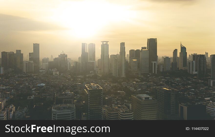 Aerial view of sunset over office building in Central Business District of Jakarta, Indonesia. Aerial view of sunset over office building in Central Business District of Jakarta, Indonesia