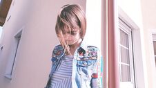 Girl Dreams Of A Beautiful House Sunny Day Colorful Clothes Stock Photography