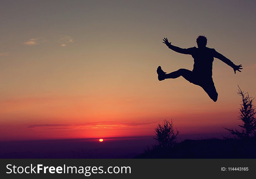 Silhouette Of A Jumping Man