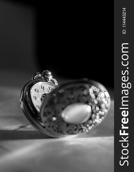 Grayscale Photo Of Pocket Watch