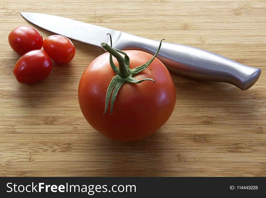 Tomatoes Near Knife
