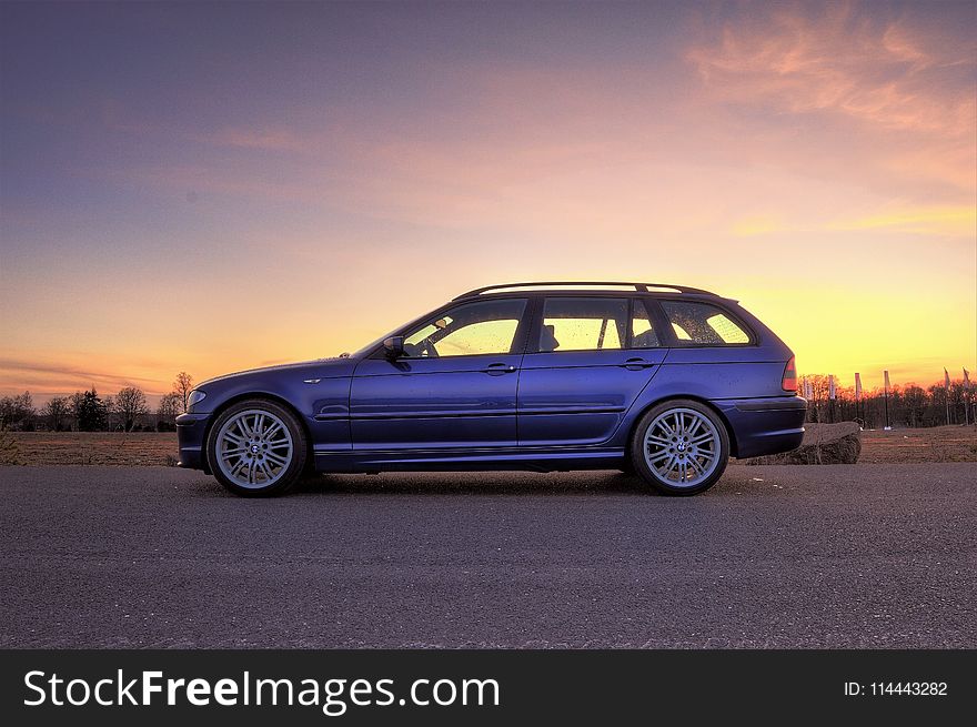 Side View Photography of Car During Dawn