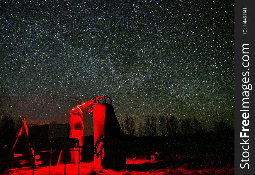 Astronomer and Milky way stars on night sky