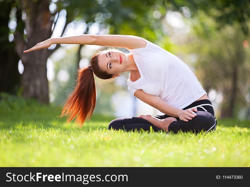 Yoga Outdoor. Happy Woman Doing Yoga Exercises, Meditate