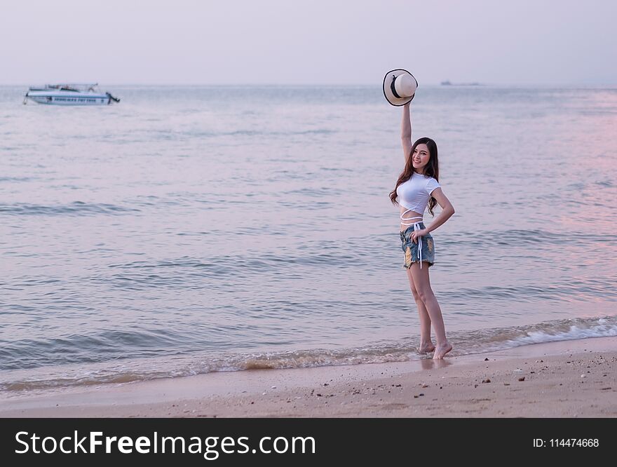Portrait of woman enjoy on sea beach