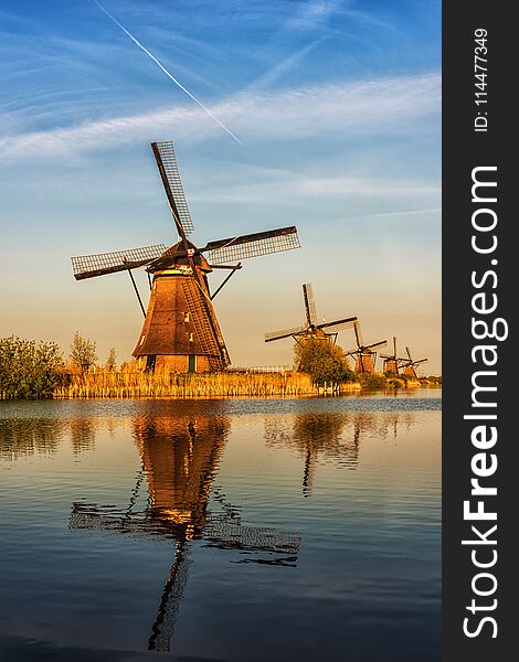 Windmills at Kinderdijk, colorful picturesque landscape, Netherland, vertical