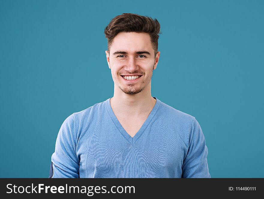 Casual Handsome Man In Blue Sweater