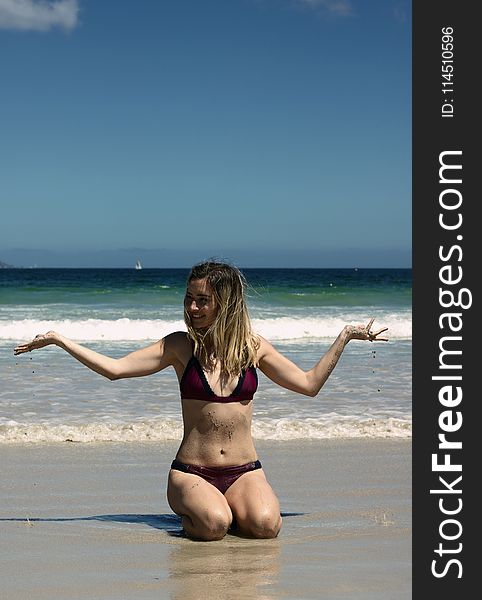 Woman Wearing Bikini On Seashore