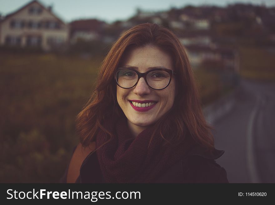 Closeup Photo of Woman Wearing Eyeglasses