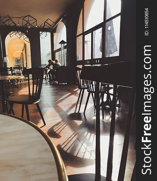 Photo of Black Wooden Dining Chair on Restaurant