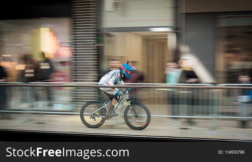 Time-lapse Photography of Man Riding Bicycle