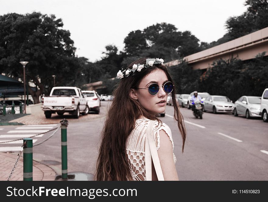 Photography Of A Woman Wearing Vintage Sunglasses