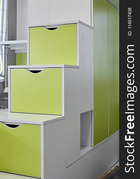 Modern stylish wooden cupboard with boxes for putting objects. Modern stylish wooden cupboard with boxes for putting objects