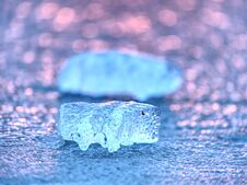 Ice Shard And Small Cracked Ice Pieces On Melring Glacier. Icy Fragments Are Melting Royalty Free Stock Photo