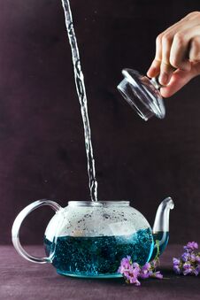Blue Butterfly Pea Tea Poured In A Glass Teapot On A Table Royalty Free Stock Images