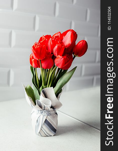 Bouquet of red tulips white background