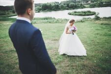 Newly Married Couple Running And Jumping In Park While Holding Hands Stock Photos Newly Married Couple Running And Jumping In Park While Holding Hands Stock Photos