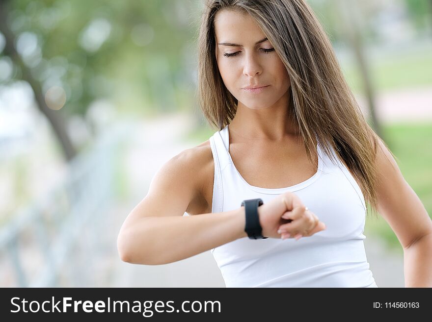 Sport, fitness. Woman is exercising on the street. Sport, fitness. Woman is exercising on the street