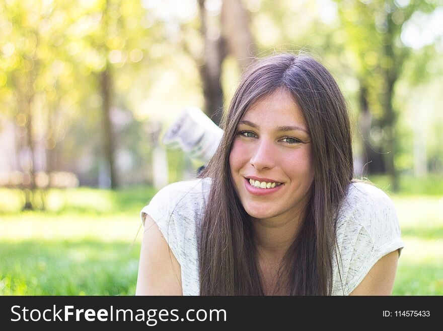 Beautiful sunny day, smiling woman portrait