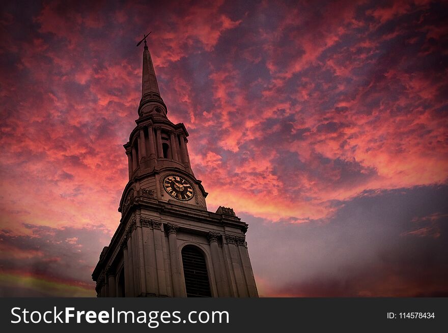 Church tower and pink sky