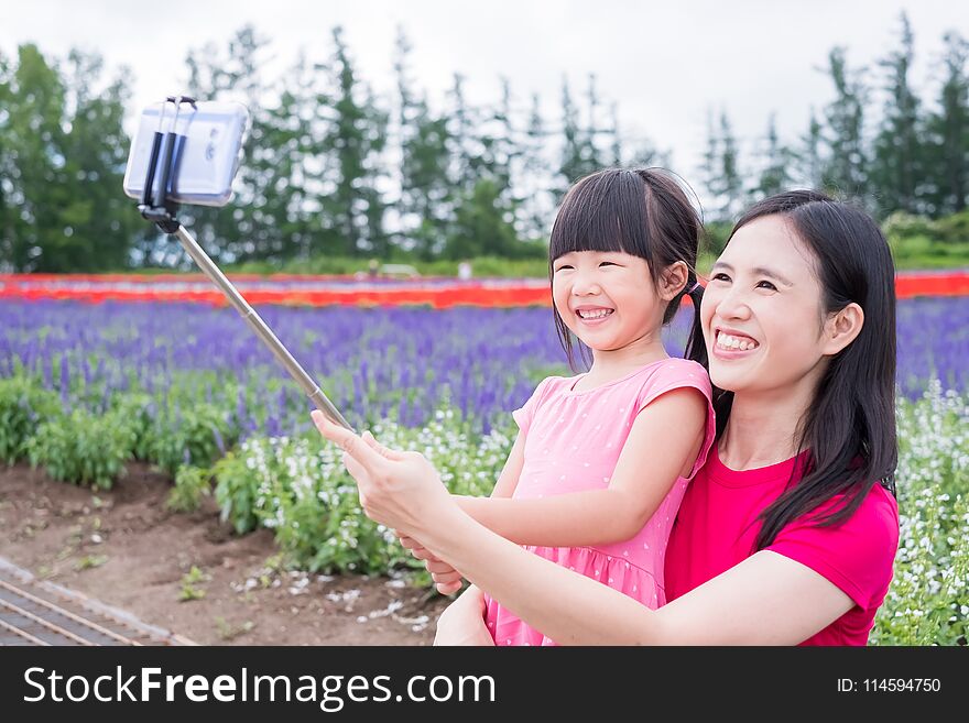 Mother and daughter selfie happily