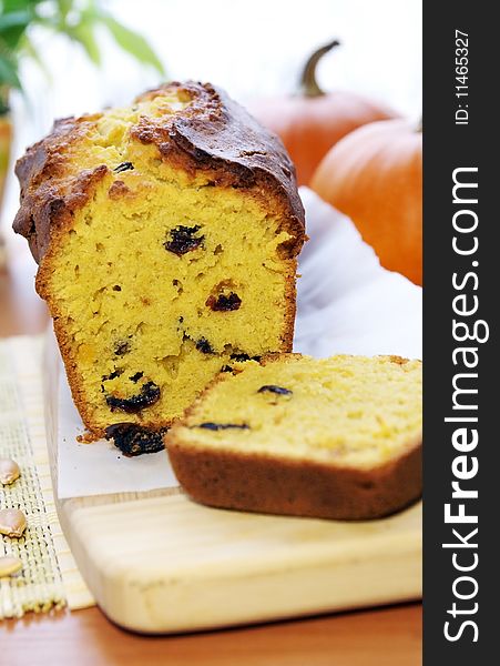 Delicious pumpkin bread with raisins - a favorite autumn tasty cake on a table